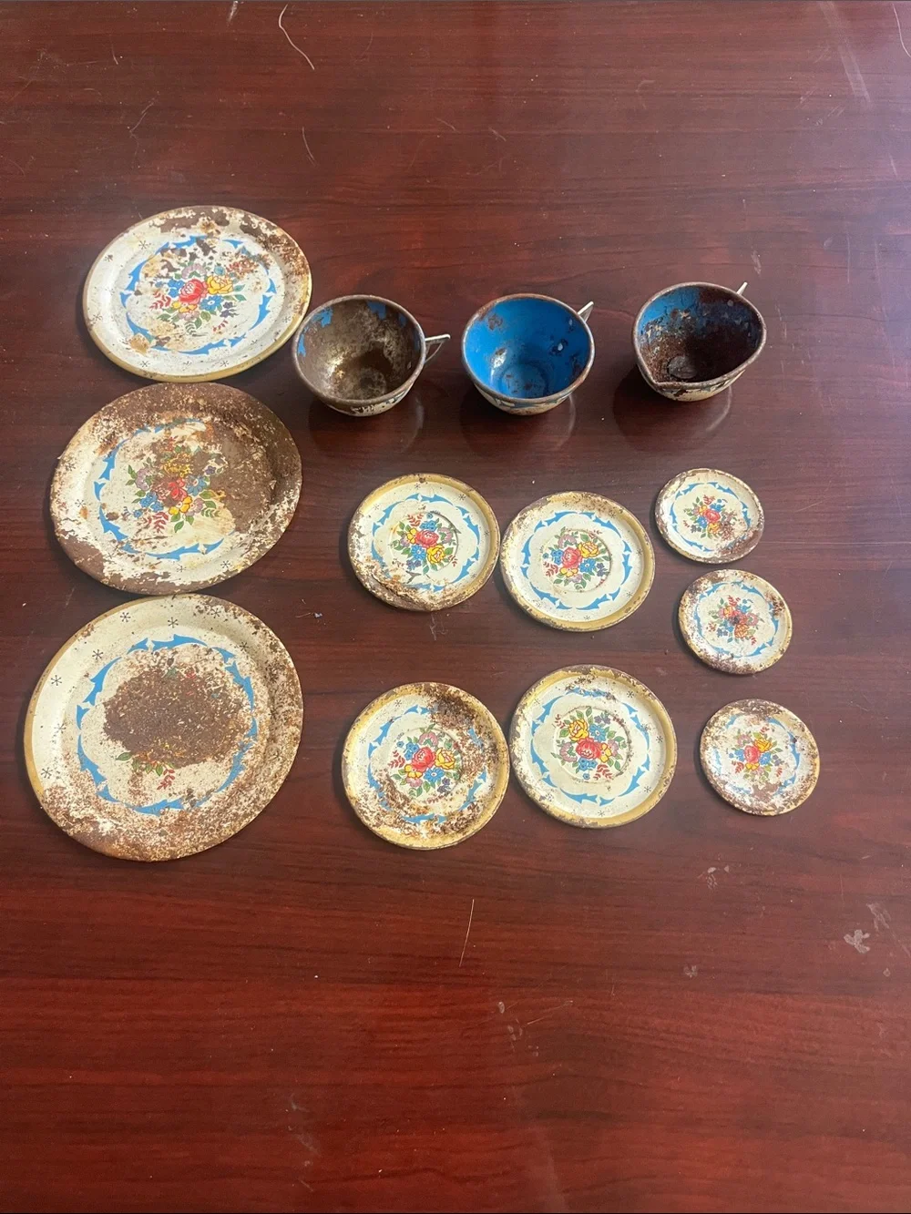 Vintage lot of Ohio Art Irwin Tin Litho Tea cups, saucers, and plates 13 pieces